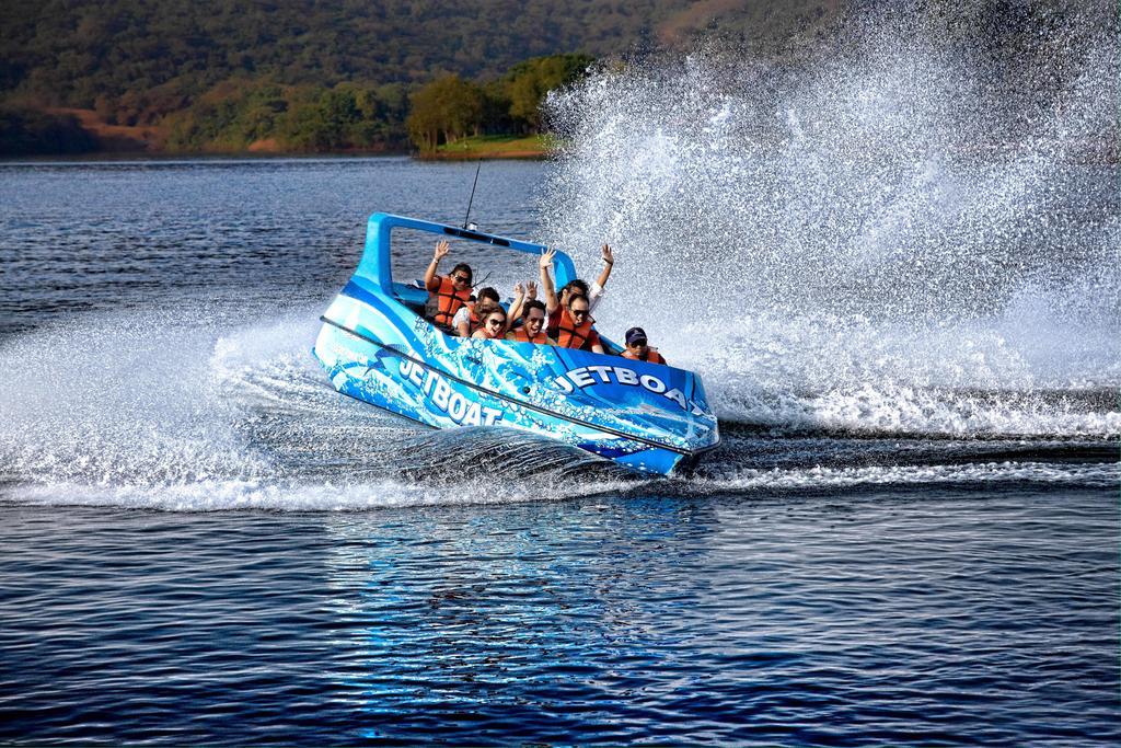 Aamby Valley City Lonavala Exterior photo Jet Boating at the dam