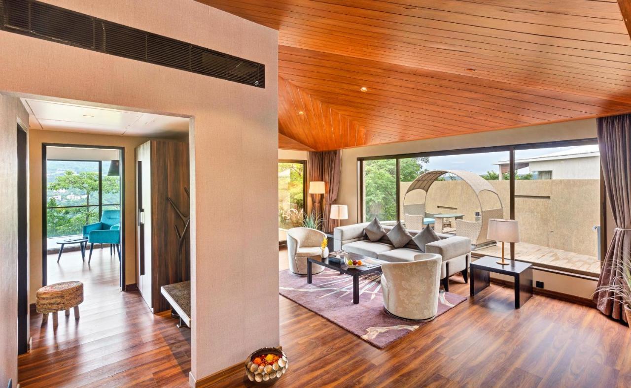 Aamby Valley City Lonavala Exterior photo The living room of a suite at the hotel